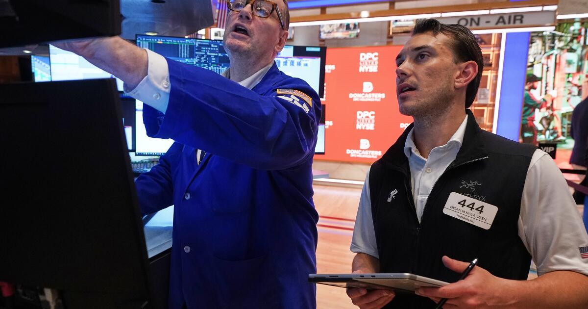 Wall Street drifts to a mixed finish after Micron soars and Apple drops